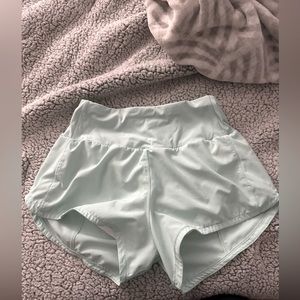 The Gym People light blue high waisted, dri-fit shorts.